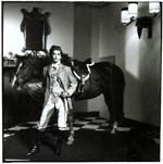 Anonymous - Female Model with Horse in Room
Click for more Images