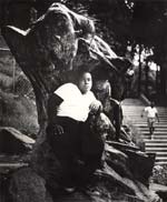 Arthur Tress - In an Old Bronze Statue a Negro Youth Sits in Morningside Park, NYC
Click for more Images