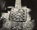 Arthur Tress - Cards and Checkerboard in Abandoned Locker Room for Railroad Workers
Click for more Images